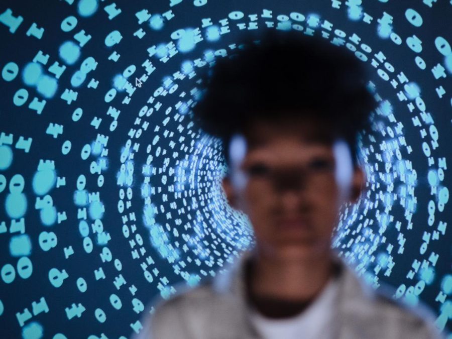 Person lit by projected data